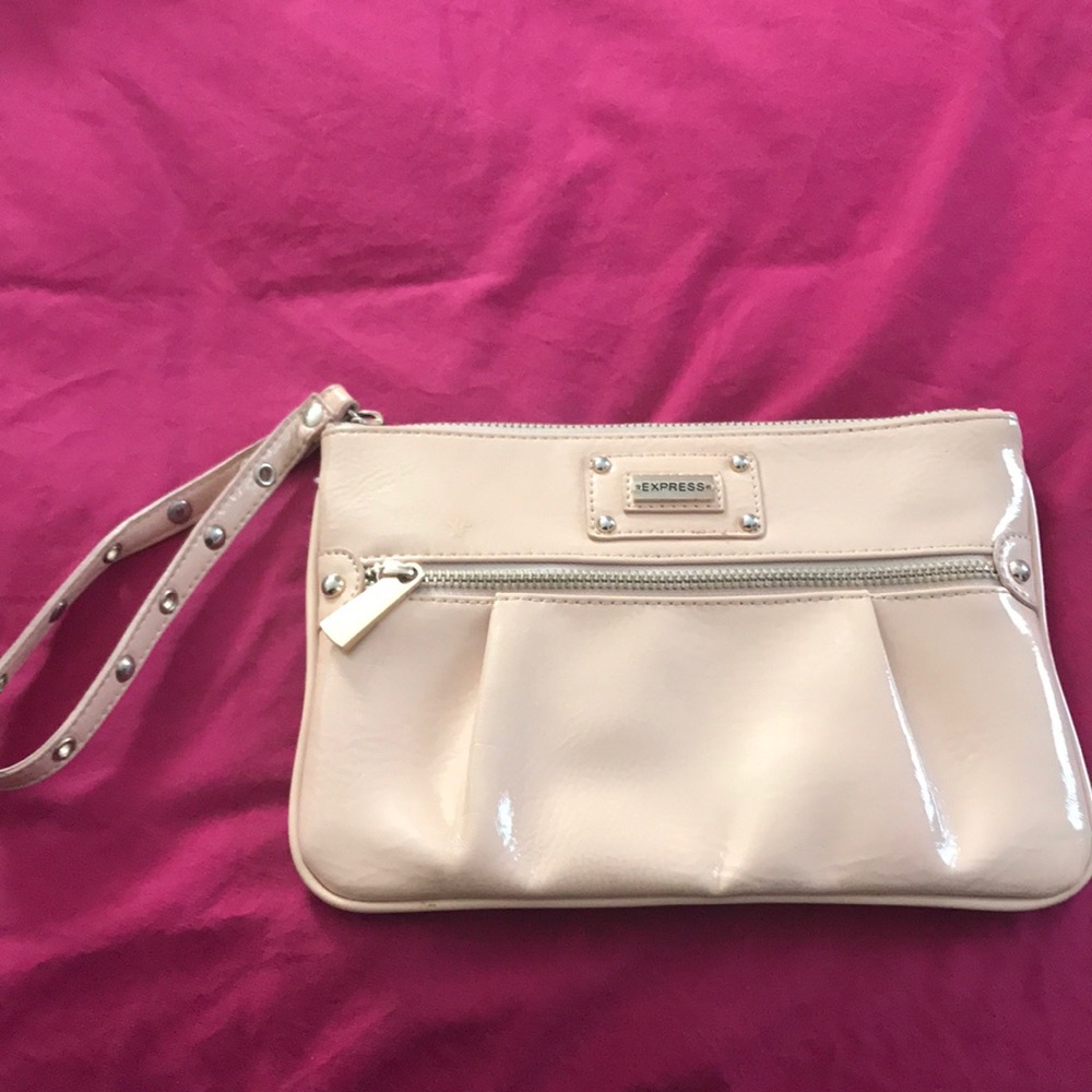 Light pink wristlet from express fits a lot